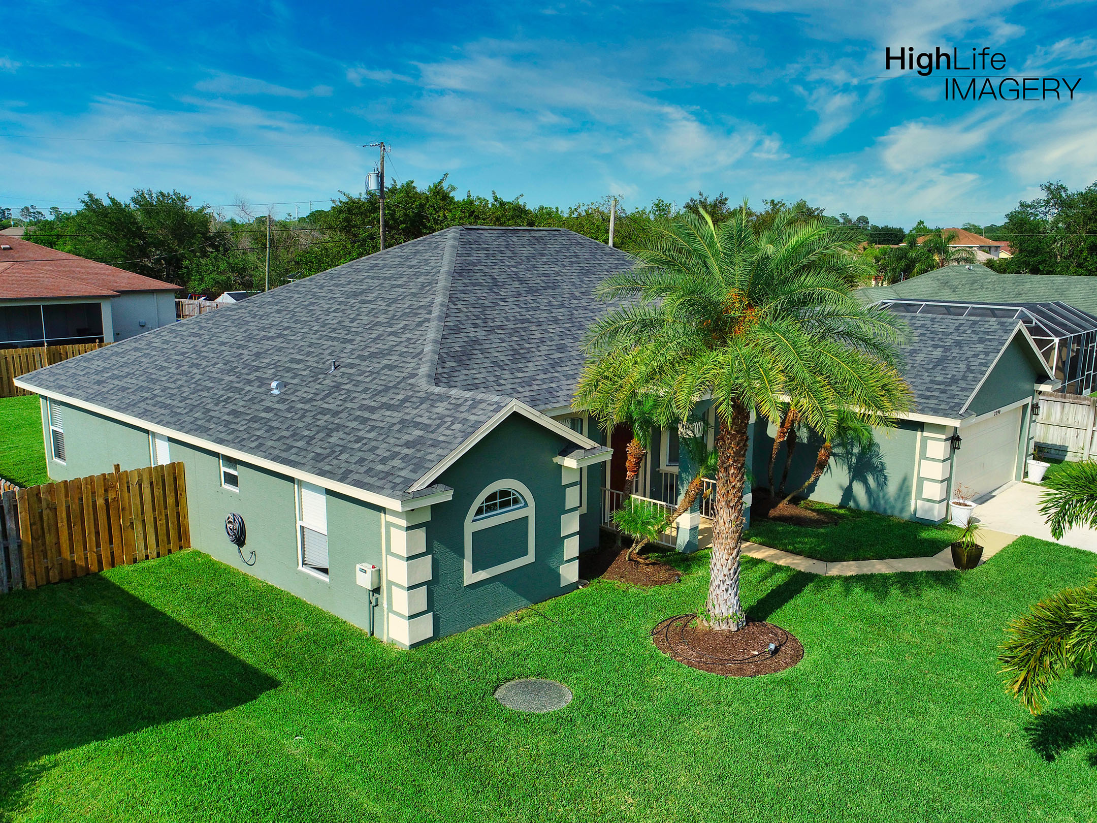 Completed residential roof providing strong, weather-resistant protection for Florida home.