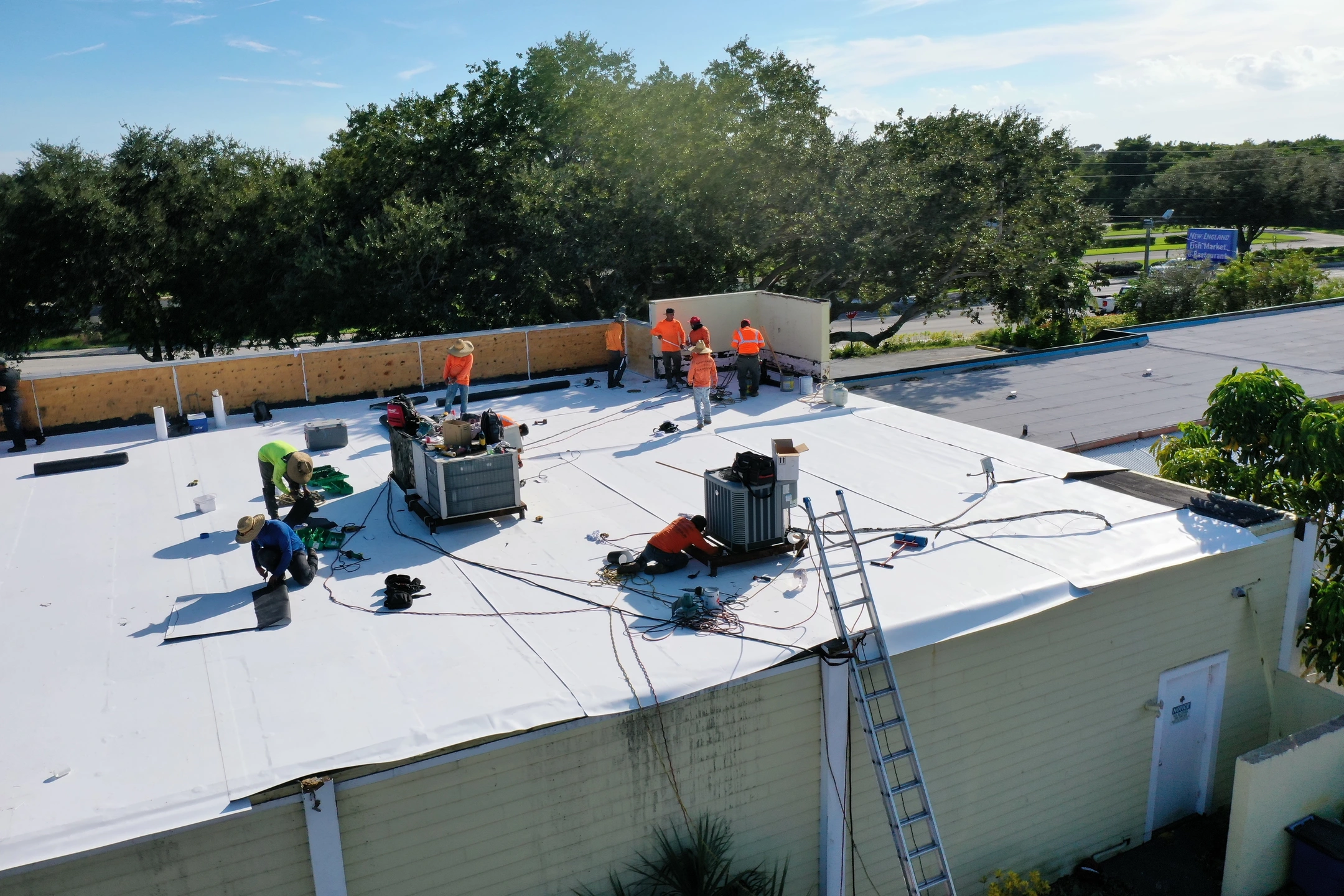 Completed flat roof installation providing long-lasting protection for Florida commercial building.