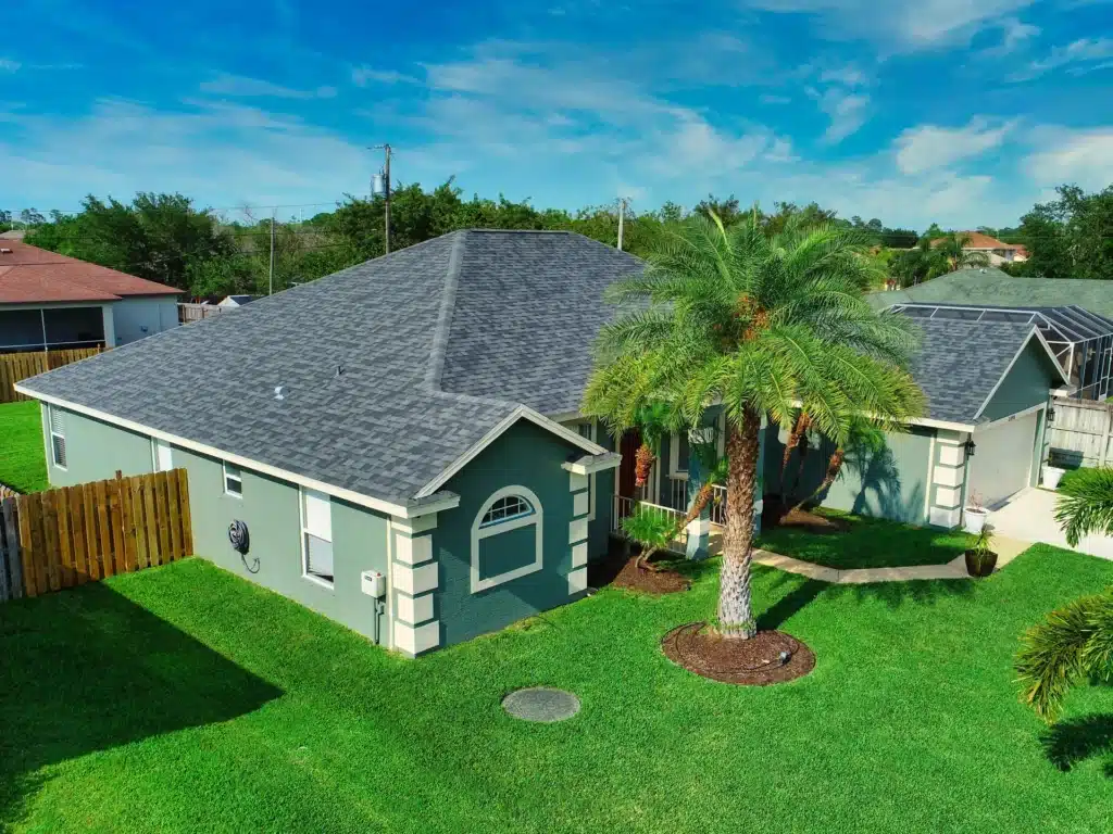 Completed residential shingle roof providing durable, weather-resistant coverage for Florida home.