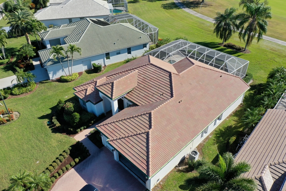 Completed roof with tile replacement ensuring strong, weather-resistant coverage for Florida home