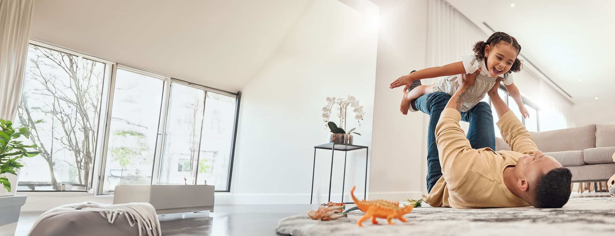 Satisfied family protected under a reliable, high-quality roof from Rhino Roofs.