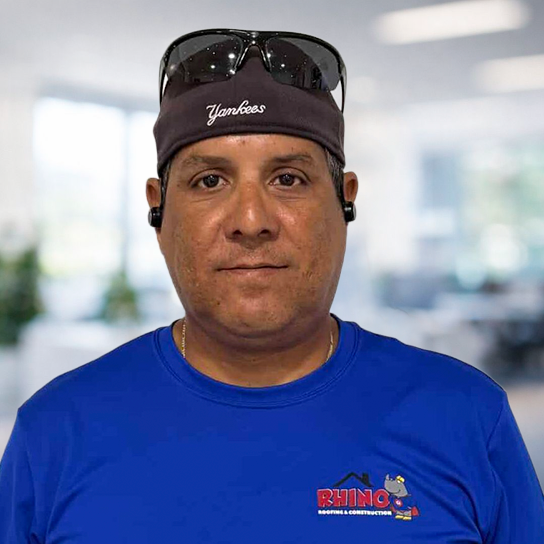 A man wearing a blue 